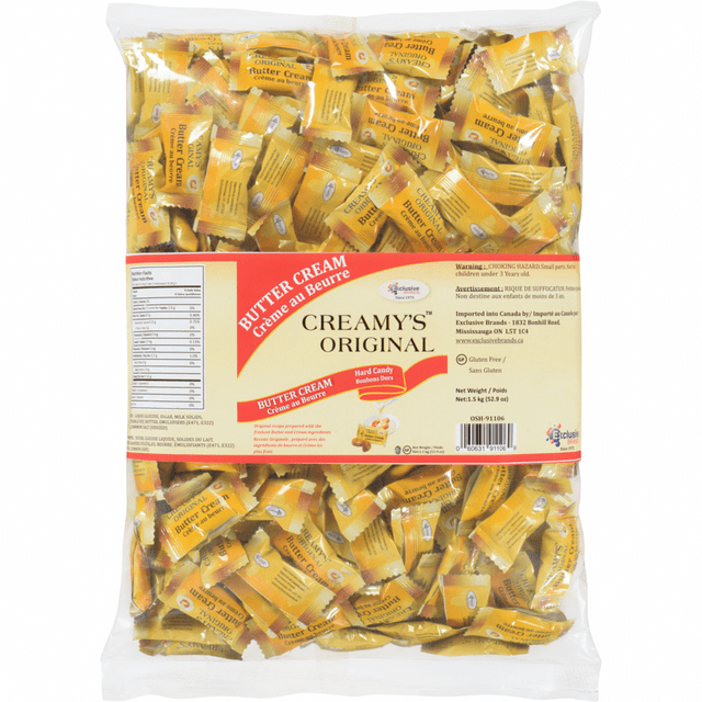EXCLUSIVE BRANDS Butter Cream Bulk Hard Candy in a 1.5 kg package. The image shows a clear plastic bag filled with individually wrapped yellow candies labeled 'Butter Cream.' The front label displays 'Creamy’s Original' and product details, including gluten-free information and nutritional facts.