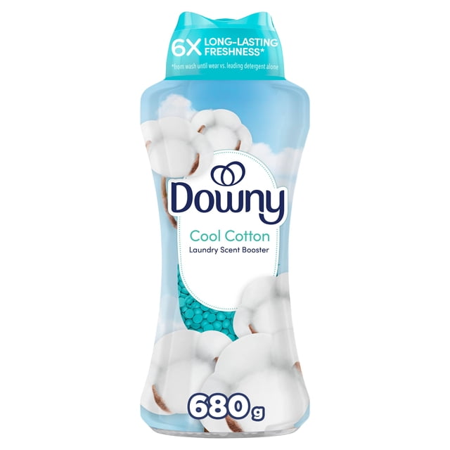 Downy Cool Cotton In-Wash Laundry Scent Booster Beads in a 680g light blue container with cotton flower graphics and a label stating 6x long-lasting freshness, suitable for all fabrics and washing machines to enhance laundry scent.
