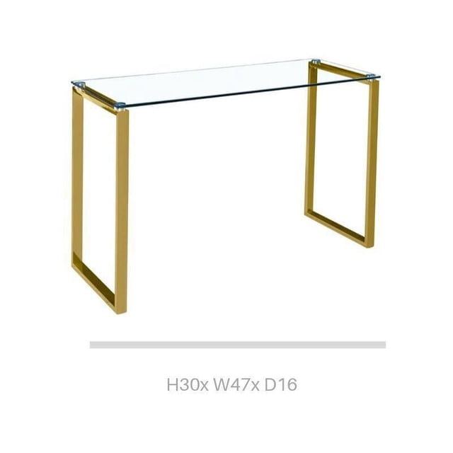 Gyna Large Console Table with a solid glass top and shiny gold rectangular metal legs, shown front-facing on a white background, ideal as an accent or hallway table for living rooms or entryways.