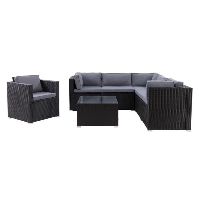 CorLiving Parksville 7-Piece Black Resin Wicker Rattan and Steel Patio Sectional Set with Extra Armchair, Cushions, & Square Coffee Table shown front-facing on a white background. The outdoor set includes an L-shaped sectional sofa and a matching armchair with black resin wicker rattan over galvanized steel frames and grey removable cushions. A square coffee table with tempered glass top and suction pads is centered in front. Designed for patio or deck use, it features weather-resistant materials and fastening clips to secure seats, ideal for comfortable outdoor lounging and social gatherings.