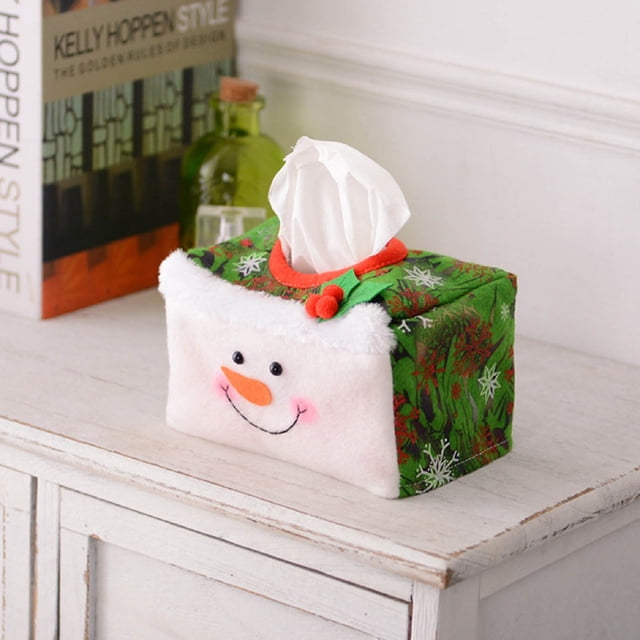 Fridja Clearance Christmas Decoration Tissue Paper Cover made of green cloth material with festive snowflake patterns and a cheerful snowman face. Designed with a top opening for easy tissue access, this cover doubles as a holiday decoration for desktops, coffee tables, or entryways, enhancing the Christmas ambiance.