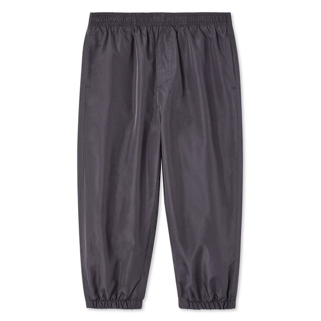 George Toddler Girls' Splash Pant in dark grey with elasticized waistband and cuffs, made of water-repellent pongee fabric with soft jersey lining, relaxed fit for girls' bottoms ideal for outdoor play.