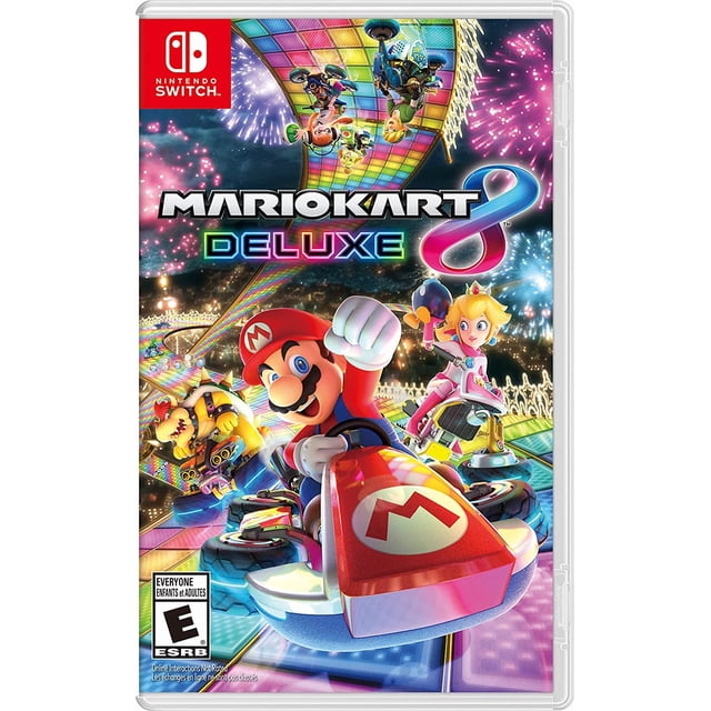 Mario Kart 8 Deluxe Nintendo Switch game cover featuring Mario in a red kart with the M emblem racing on the colorful Rainbow Road track with fireworks, accompanied by Bowser and Princess Peach in pink racing outfits, showcasing the vibrant multiplayer racing game.