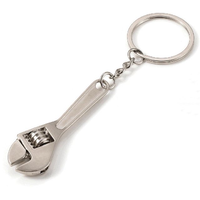 Small Mini Adjustable Spanner Wrench Alloy Steel Hand Tool H79C designed as a decorative keychain accessory. Made from silver zinc alloy and stainless steel, it features a functional adjustable nut mechanism. Compact and lightweight, ideal for keys, wallets, or bags.