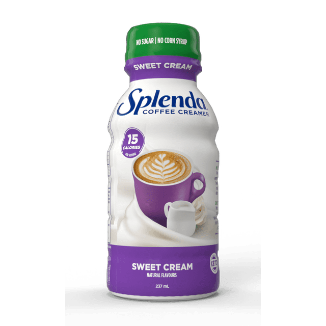Splenda Sugar Free Sweet Cream Coffee Creamer 236mL bottle with green cap and purple label, featuring a purple coffee cup with latte art and a small white creamer pitcher, highlighting 15 calories per serving, no sugar, no corn syrup, keto-friendly natural flavours, suitable for adding rich, creamy taste to coffee without added calories.