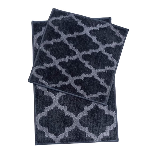 Home Decor Inc. Austin Micro 2-Piece Bathmat Set in grey featuring a soft microfiber surface with a geometric quatrefoil pattern, includes one 18" x 18" and one 18" x 28" mat with skid-resistant backing for bathroom comfort and safety, also suitable as a small area rug for entryways.