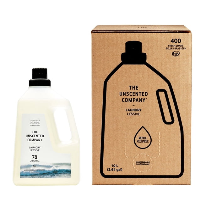 The Unscented Company Laundry Refill Box with Laundry Bottle, designed for 478 loads in high-efficiency machines. Includes a 10 L (2.64 gal.) refill box made of cardboard with a detergent bottle outline and a 1.95 L (65.9 oz.) white bottle with a black cap and ocean wave label. This hypoallergenic, fragrance-free, dye-free, and phosphate-free liquid detergent is vegan, cloth-diaper friendly, and effective in cold water. Certified Leaping Bunny and B Corporation.