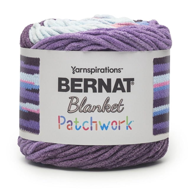 Bernat® Blanket Patchwork™ #6 Super Bulky Polyester Yarn in a chenille texture with variegated stripes of purple, blue, pink, and white, 300g/10.5oz, 220 yards, shown front-facing with the label displaying the brand and product name, ideal for soft home decor projects like blankets and pillows.