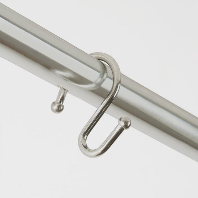 Mainstays S-Shaped Decorative Shower Curtain Hooks in brushed nickel finish hanging on a polished metal shower rod, made of rust-resistant metal with ball ends to hold curtains securely, ideal for standard shower curtains and liners.
