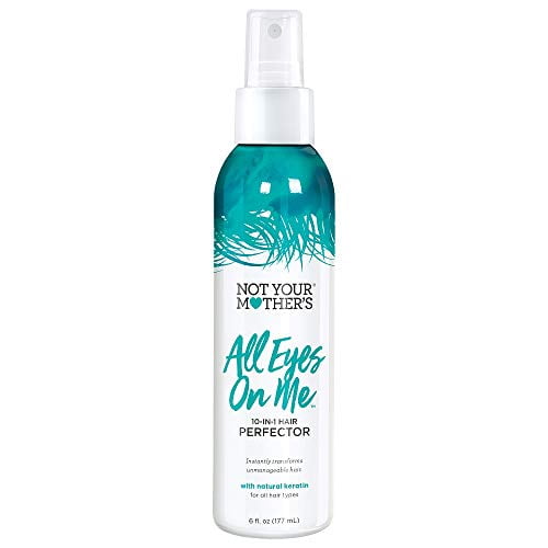 Not Your Mothers All Eyes On Me 10 In 1 Hair Perfector, 6 Ounce spray bottle with a teal and white design. This hair styling spray offers 10 benefits in one product, including frizz control and nourishment. The bottle features a clear cap and is ideal for versatile hair care.