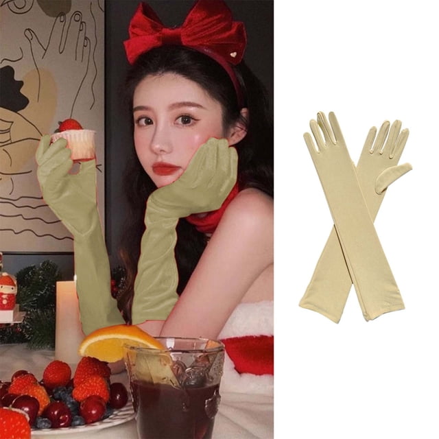 Mefallenssiah Gants d'Opéra Longs Extensibles au-Dessus du Coude pour Adultes en Spandex beige, Montrés dans un Cadre de Style de Vie avec une Personne Qui les Porte Tenant un cupcake. les Gants Sont Faits d'Un Tissu Spandex Extensible, Conçus pour s'Adapter Facilement à la Plupart des Mains. une image Séparée Affiche les Gants Posés à Plat, Mettant en Valeur Leur Longueur au-Dessus du Coude et Leur texture Lisse. Convient aux Fêtes Costumées, Bals, Opéras, cosplay Ou Événements Formels Professionnels Nécessitant une Couverture Élégante des Mains.