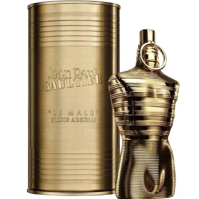 Jean Paul Gaultier Le Male Élixir Absolu 125ML 4.2oz Parfum Intense pour Hommes. l'Image Présente une Bouteille de Parfum Dorée en Forme de Torse avec un design Côtelé, Assortie à un Contenant Cylindrique Doré Assorti Embossé du Nom de la Marque et des Détails de Parfum. Ce Parfum Aromatique Boisé Présente des notes de Prune, de Cannelle, de Cardamome, de Bergamote, de Lavande et de patchouli.