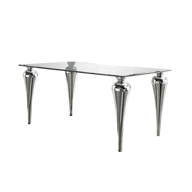Home Gear Dining Table with a rectangular bevelled tempered glass top supported by four polished steel curved column legs, designed for modern kitchen and dining furniture, also suitable as a stylish workspace table.