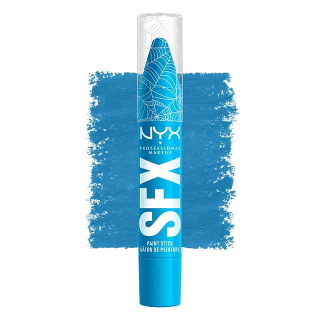 NYX PROFESSIONAL MAKEUP SFX Face & Body Paint Stick in SPELL CASTER blue with a clear cap featuring white spiderweb designs, standing upright against a textured blue paint swatch, creamy matte formula suitable for Halloween special effects and body makeup.