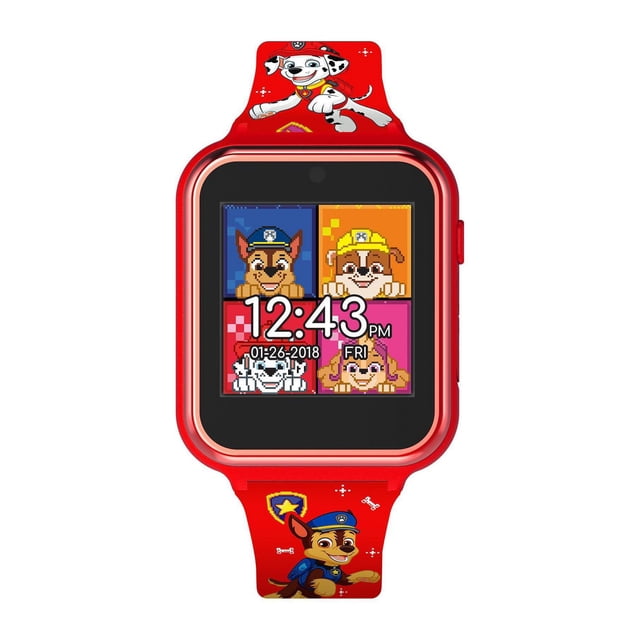 Paw Patrol Touch Screen Interactive Watch with Camera in red plastic featuring a square digital touchscreen displaying pixel art Paw Patrol characters and the time 12:43 PM, date 01-26-2018, and day Friday. The red watch band shows printed images of Paw Patrol dogs Marshall and Chase with small bone and badge icons, suitable for children aged 6 and up.
