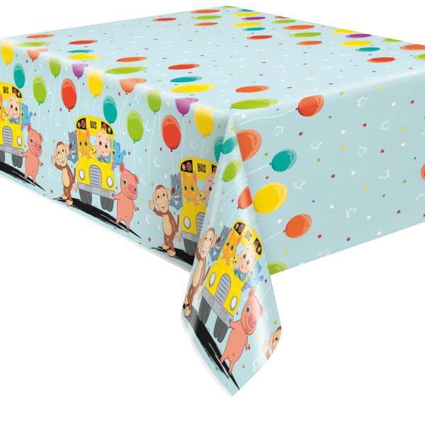 Cocomelon Rectangular Plastic Table Cover, 54" x 84", featuring a light blue background with colorful balloons and confetti, decorated with Cocomelon characters including a yellow school bus with children and animals along the edges, disposable and wipe-clean for easy party use.