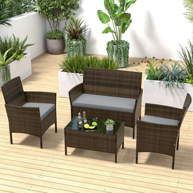 Costway 4 PCS Patio Furniture Set with Washable Cushions and Tempered Glass Coffee Table in grey, featuring a loveseat, two armless chairs, and a rectangular coffee table with a tempered glass top. The set is crafted with hand-woven mix brown PE rattan and a sturdy metal frame, designed for outdoor use in patios, gardens, or poolside areas. The grey cushions are soft, thick, and removable for easy cleaning. The coffee table provides a stylish and functional centerpiece for refreshments or decor. Dimensions include loveseat: 39.5 x 22.5 x 32 inches, chairs: 23 x 22 x 32 inches, and coffee table: 28 x 16 x 16 inches.