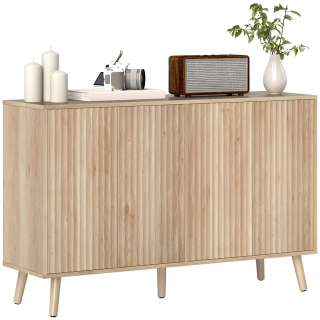 HOMCOM Sideboard Modern Fluted Buffet Cabinet with Adjustable Shelves in oak finish. Features fluted door panels, two double-door cabinets with adjustable shelves, and a particleboard frame supported by five pine wood legs. The elevated design allows for easy cleaning, and the push-to-open doors create a sleek, handle-free look. Suitable for use as a sideboard, living room cabinet, or entryway cabinet.