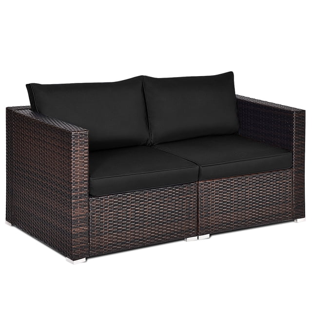 Patiojoy 2-Piece Patio Wicker Corner Sofa Set, a rattan loveseat with black removable cushions, ideal for outdoor sectionals or patio furniture arrangements. Made with durable PE rattan and a steel frame, it features aluminum feet to protect floors and ergonomic armrests for comfort. The washable cushion covers enhance convenience. Each corner sofa measures 29.5 inches by 29.5 inches by 25.5 inches, suitable for versatile outdoor seating setups.