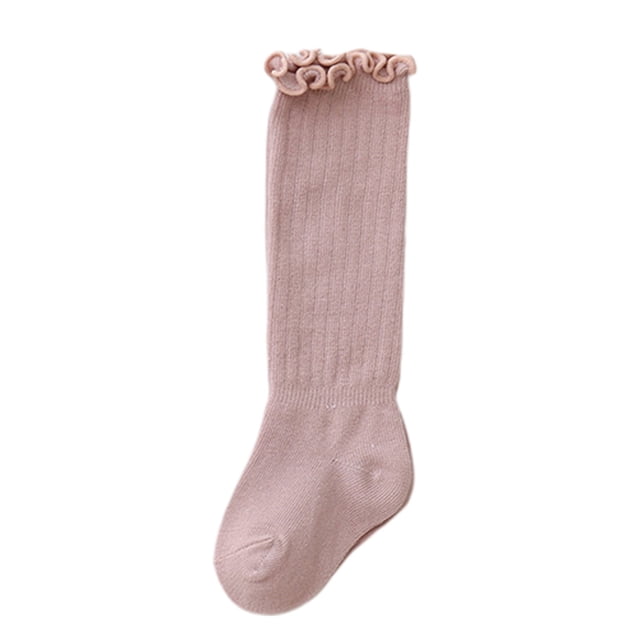 Newborn Baby Thigh High Sock in pink, made of breathable combed cotton with a crimped top design. The sock features a seamless toe and a fitted heel for comfort and secure wear. Suitable for babies aged 0-3 years, available in sizes S, M, and L. Ideal for all seasons.