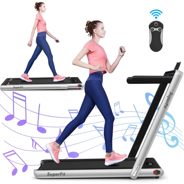Gymax 2 in 1 Folding Treadmill 2.25HP Running Machine in silver, shown in two configurations: as a running treadmill with a raised handlebar and as an under-desk walking treadmill. Features a dual display for tracking time, speed, distance, and calories. Includes a 5-layer non-slip running belt, Bluetooth speakers, and a remote control. Compact design with transport wheels for easy storage.