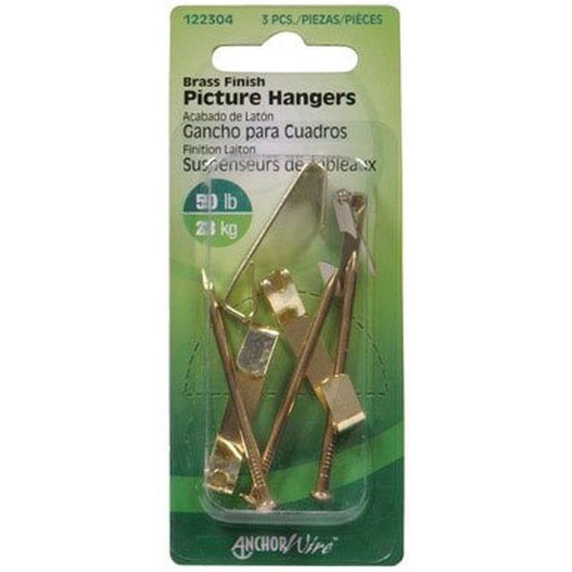 BRASS HANGER KIT 3 P with three brass-plated steel picture hangers and nails, each rated for 50 lb (23 kg) weight capacity, displayed in green Anchor Wire packaging, designed for secure picture hanging in home improvement projects.