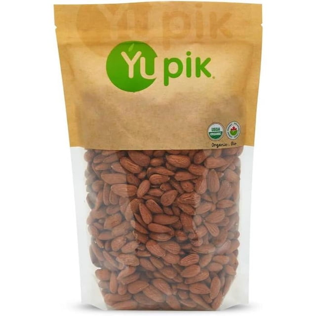 Yupik - Raw Eu Almonds Organic, 1kg in a resealable brown and clear pouch. The pouch displays the Yupik logo in green and certifications for USDA Organic and Kosher. The almonds, ideal for nut toppings, are visible through the transparent section of the packaging.