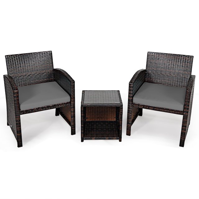 Gymax 3PCS Rattan Patio Conversation Furniture Set with two mix brown rattan chairs featuring ergonomic curved armrests, grey cushions, and a coffee table with tempered glass top and storage space. Weather-resistant and ideal for outdoor use in gardens, patios, or poolside lounging.