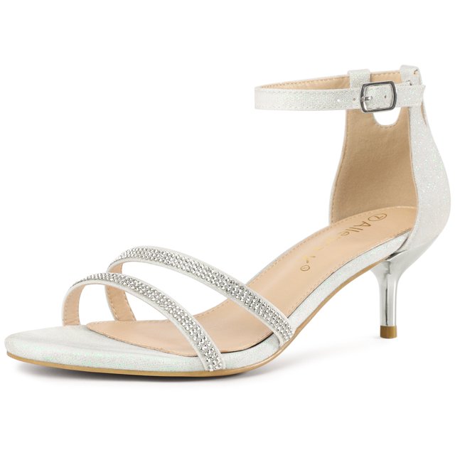 BLISSFUL STEP Women's Stiletto Kitten Heels White Glitter Heel Sandals in size 7.5 M US. Glitter vamp, open toe design, and ankle strap with buckle closure. Stiletto heel measures 2 3/8 inches. Perfect women's heels for pairing with dresses, skirts, or jeans for casual or formal occasions.