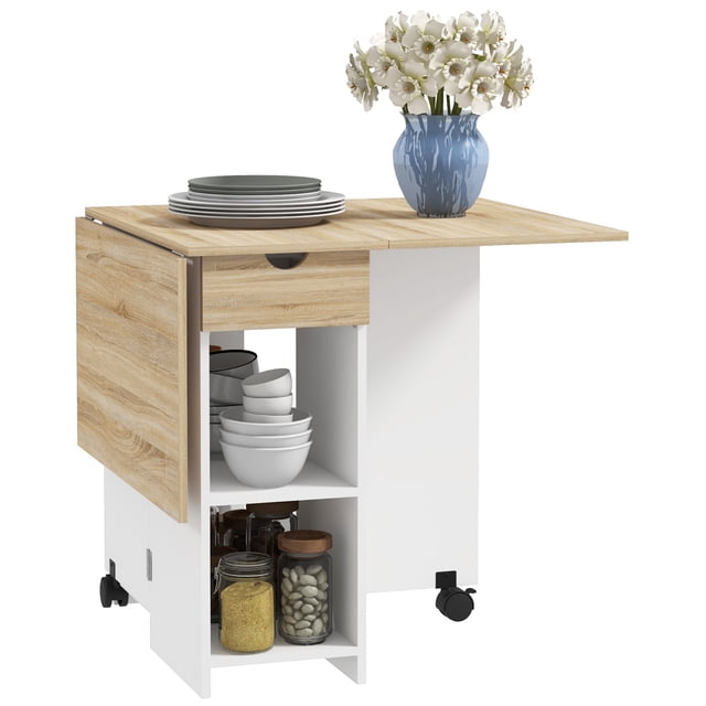 HOMCOM Foldable Dining Table with a drop leaf design, featuring an oak-coloured particleboard tabletop and white base. The table includes two side leaves for adjustable length, a built-in drawer with steel slides, and two storage shelves for utensils and tableware. It is equipped with two ABS rolling castors for mobility and has a melamine-coated surface for easy cleaning. Suitable for seating up to four people, ideal for small kitchens or as an accent piece in larger rooms.