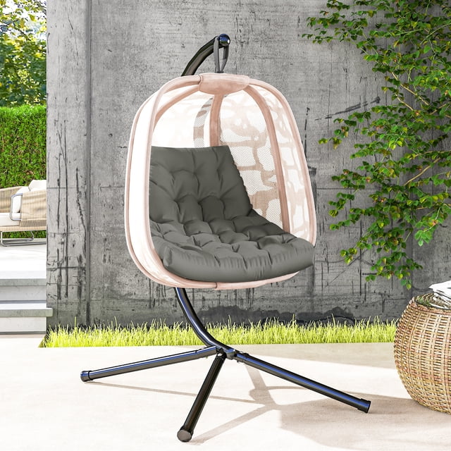 Outsunny Outdoor Swing Cushion, Tufted Patio Cushion Replacement in grey, displayed on an egg chair in an outdoor patio setting. The cushion features a tufted design to prevent filling from shifting, dual-colour polyester fabric that is breathable, fade-resistant, and easy to clean, and thick cotton filling for prolonged comfort. Ideal for enhancing patio decor and suitable for swing chairs and egg chairs, with dimensions of 47.2 inches long, 39.4 inches wide, and 3.1 inches deep.