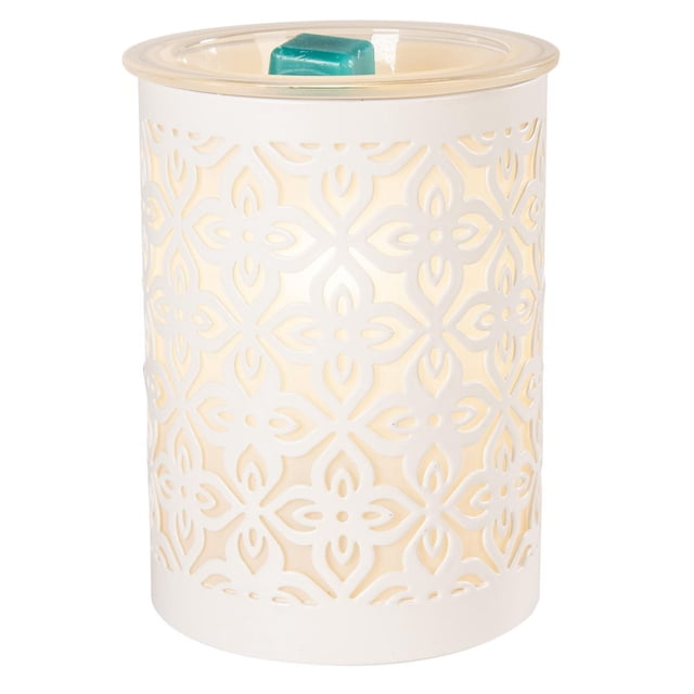 ScentSationals Full Size Warmer - Maebly with white metal floral cutout pattern softly illuminated by a 25W light inside, featuring a glass dish holding a teal wax melt cube, providing a safe, soot-free way to fragrance indoor spaces.