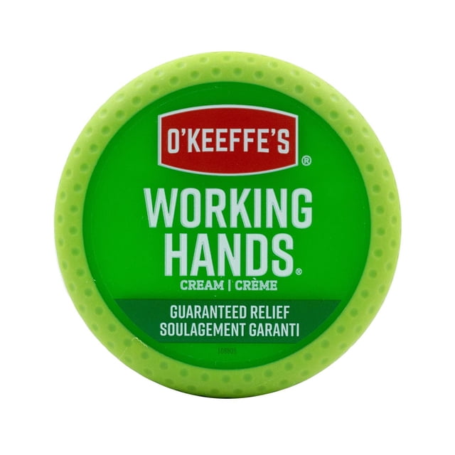 O'Keeffe's Working Hands Crème dans un Contenant Rond Vert avec Couvercle Texturé, Présentant le Nom de la Marque sur une Étiquette Rouge et un Texte Garantissant le Soulagement en Anglais et en Français, une lotion pour les Mains Concentrée Cliniquement Prouvée pour Guérir et Hydrater les Mains Extrêmement Sèches et Gercées, Convient Aussi pour Protéger la Peau contre la Perte d'Hydratation.