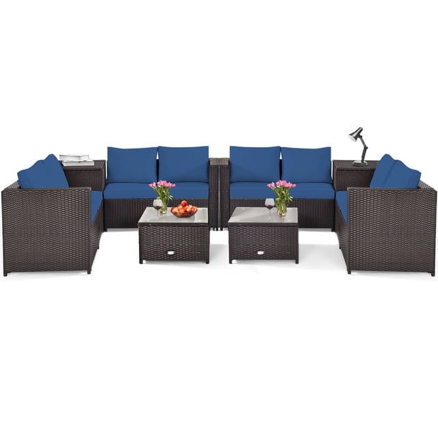 Patiojoy Ensemble de Canapé Sectionnel d'Extérieur en Rotin de 8 Pcs pour Causeuse et Conversation, Bleu Marine, au design Modulaire avec Quatre Causeuses, Deux tables Basses et Deux tables d'Appoint. Fabriqué avec un Osier PE Résistant aux Intempéries et des Coussins Épais pour le Confort. Comprend une Boîte de Rangement Fonctionnelle pour l'Organisation. Idéal pour les patios, les Jardins Ou les Environnements au Bord de la Piscine.