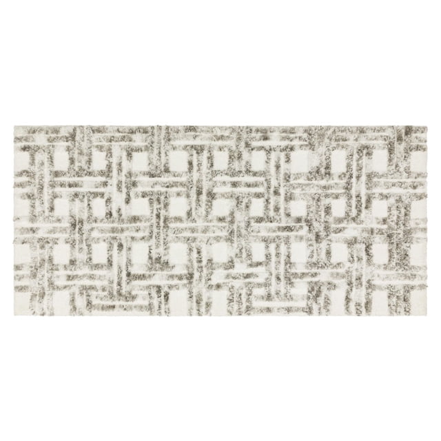 Hometrends Emissary Bath Rug, Grey, 20" x 45", rectangular with a plush pile and geometric interlocking pattern in grey on a light grey background, featuring textured latex backing for slip resistance on bathroom floors, also suitable as a soft spa or vanity mat.