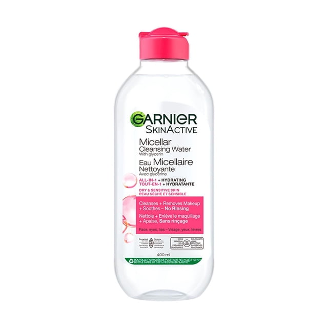 Garnier Micellar Water Face Wash & Makeup Remover for Dry Skin in a clear 400ml bottle with a pink flip-top cap, hydrating cleansing water with glycerin that removes makeup, soothes, and cleanses dry, sensitive skin without rinsing, suitable for face, eyes, and lips.