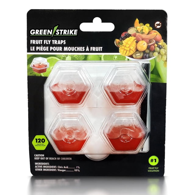 The GREENSTRIKE® Prefilled Fruit Fly Trap pack features four hexagonal clear plastic pods filled with red non-toxic attractant solution, providing natural and effective pest control for fruit flies in garden and home settings, with bilingual English and French packaging and fruit illustrations.
