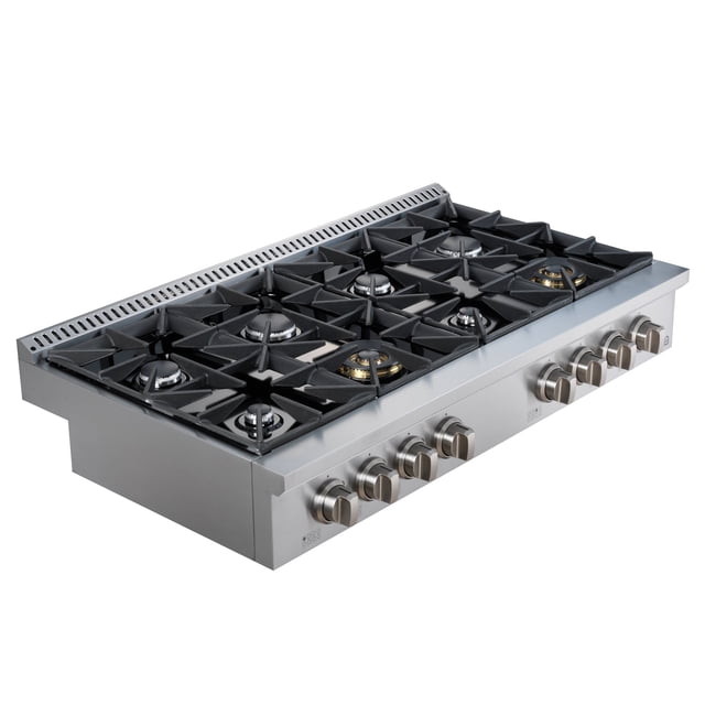 Ancona Cuisinière à Gaz Encastrée en Acier Inoxydable de Style Commercial de 48 Po avec Huit Brûleurs DEFENDI Fabriqué en Italie à Débit BTU Variable, Grilles en Fonte Pleine et Boutons de Commande avant Audacieux. la Cuisinière Comprend un Gril/grille Réversible et Amovible, une base en Émail Noir Résistante aux Rayures et un Allumage Électronique avec Ré Allumage Automatique. Conçue pour le Gaz Naturel avec Capacité de conversion LP, Elle Fonctionne à 120 V et Est Certifiée ETL.