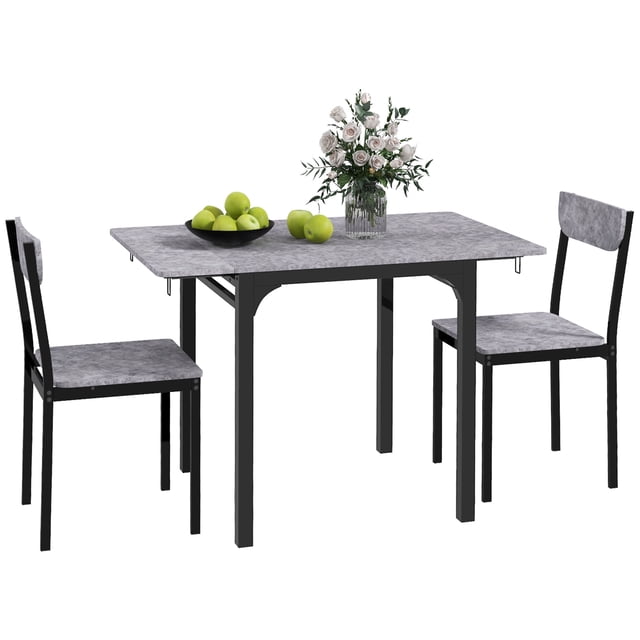 HOMCOM Ensemble de Table à Manger Pliable pour 2, Comprenant une Table à Abattants avec un Dessus en MDF Gris Pâle et un Cadre en Acier Noir, Assorti à Deux Chaises Assorties. la Table Est Montrée Déployée avec des Articles Décoratifs, Incluant un Bol de Pommes Vertes et un vase de Fleurs, Mettant l'Accent sur Son design Gain de Place, Idéal pour les Petites Salles à Manger Ou les Appartements. le Plateau Extensible et les Chaises Compactes la Rendent Adaptée aux Cuisines à Espace Limité.