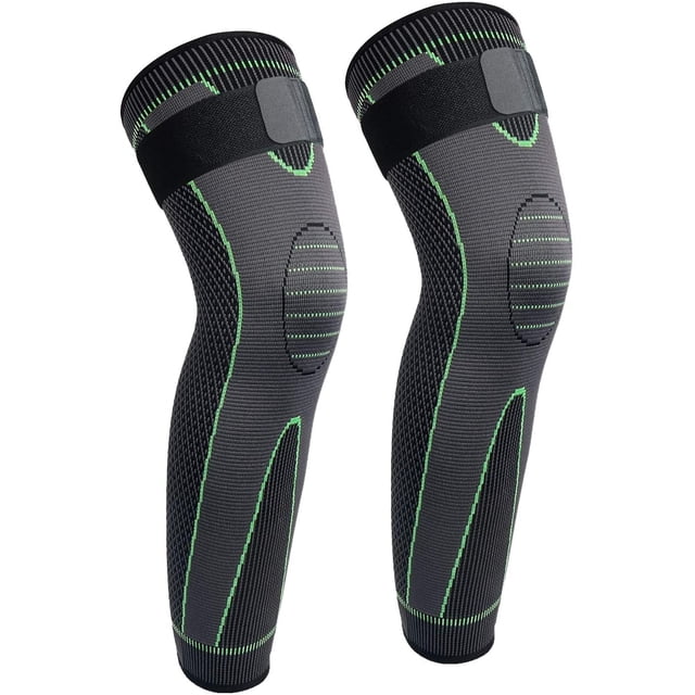 Manchons Complets pour Jambes Longues, Paire de Manchons de compression pour Hommes et Femmes, avec design Ergonomique et Bande Ajustable pour Stimuler la circulation, Réduire l'Enflure et Offrir du Soutien. design Noir et Vert avec Rotule Renforcée et Matériau Résistant à l'Usure, Idéal pour les sports comme le basketball, le Cyclisme, le football et la Récupération après l'Entraînement.