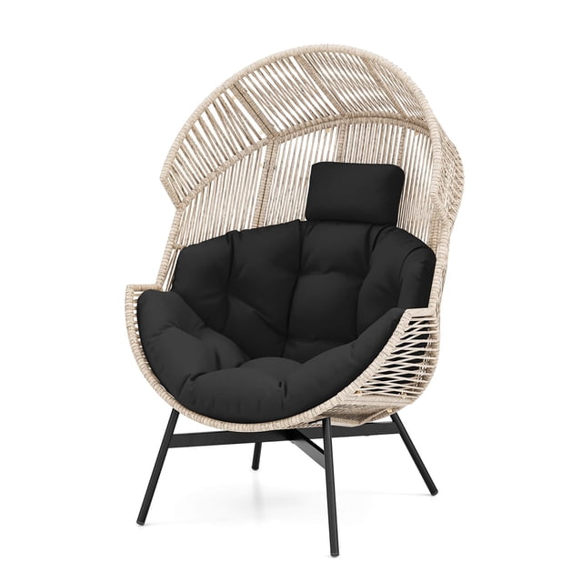 Gymax Wicker Stationary Egg Chair Lounge Basket Sofa Chair with a heavy-duty black metal frame and light brown rattan weave. Features a spacious ergonomic design with black cushions, including a padded headrest. Suitable for indoor and outdoor use, it measures 40'' x 38'' x 55'' and supports up to 400 lbs. Ideal for patios, living rooms, or poolside relaxation.