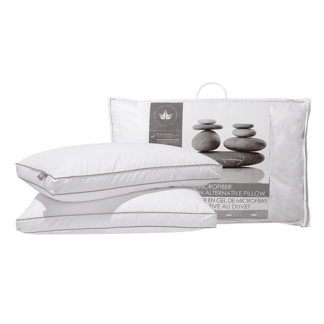 Gel Microfiber Down Alternative Pillow - Two Pack - King Size, featuring two white pillows with a 2-inch gusseted edge for improved support and neck alignment. Made with 100% cotton and 300 thread count to prevent fill from escaping, these pillows are filled with hypoallergenic gel microfiber for down-like comfort. The set is displayed with its packaging, which highlights its OEKO-TEX Standard 100 certification and easy-care machine washable design.