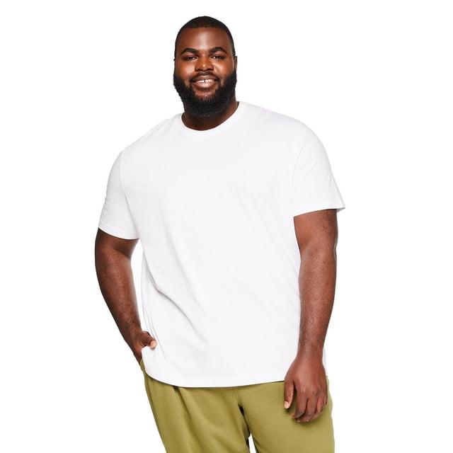 George Big Men's Short Sleeve Tee in white shown front-facing on a model wearing olive green pants, featuring a crew neckline, short sleeves, and straight hem made from soft 100% cotton jersey, ideal for casual or layered outfits.