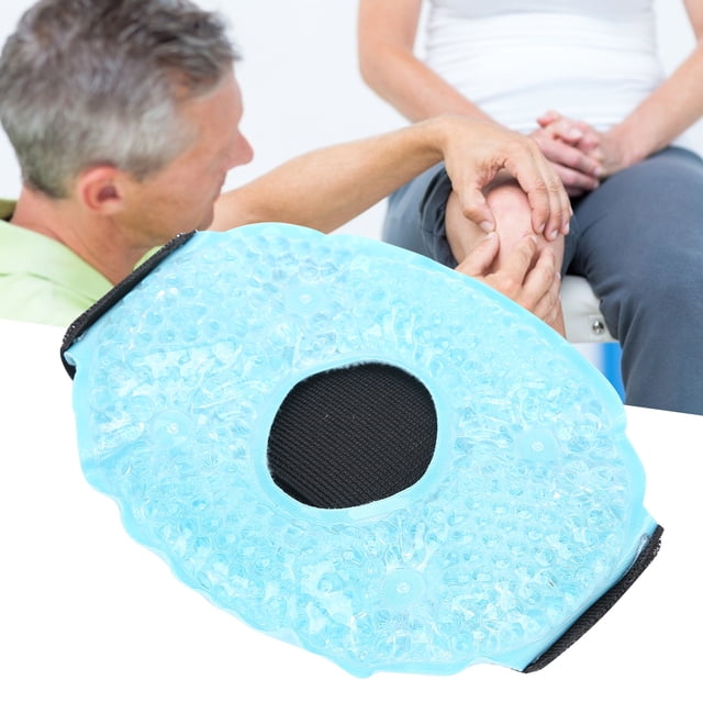 Knee ice pack reusable gel wrap by Fyydes, designed for hot and cold therapy to relieve muscle soreness and sports injuries. The pack features a blue PVC and gel construction with a plush backing, an adjustable band for secure placement, and a central opening for knee comfort. Approximate size is 50 x 14 cm (19.7 x 5.5 in). Suitable for heat therapy by warming in water or a microwave, and cold therapy by refrigerating or freezing. Shown in use for knee pain relief.