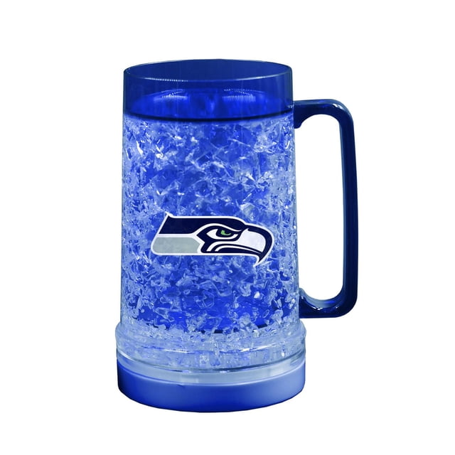 FREEZER MUG 16OZ NFL SEATTLE SEAHAWKS with double-wall crystal-gel insulation in a clear blue body, blue handle, and official team logo on the front, designed to keep drinks cold for parties and outdoor events, also suitable for use where glass is prohibited.