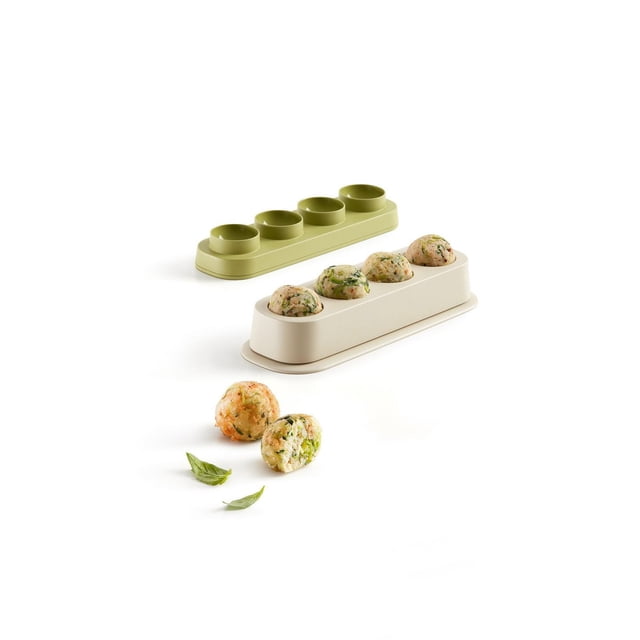 Lekue Veggie Ball mold set with four round cavities in beige and light green, shown with four uncooked vegetarian meatballs inside and two cooked veggie balls with herbs on a white background, designed for hygienic, uniform preparation of vegetable meatballs ideal for vegan and vegetarian diets.