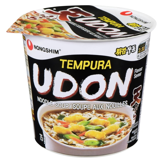 Nongshim Tempura Udon Noodles Soup Cup in a white and black container with yellow and white text, featuring udon noodles with tempura and vegetables in broth, 75 g instant soup ideal for quick meals or on-the-go dining.