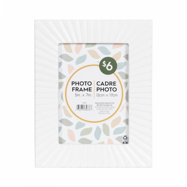 DesignOvation Sunni 5x7 White Picture Frame with a dimensional sunburst design on the white frame, holding a 5 by 7 inch photo, ready to hang vertically or horizontally with an attached easel for tabletop display, suitable for home décor or gifting.