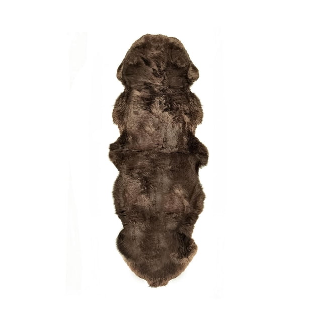 NEW ZEALAND SHEEPSKIN DOUBLE RUG/RUNNER 2' X 6' in brown with a natural irregular shape, made from dense 100% New Zealand sheepskin wool with a thick 2.5-inch pile and soft microsuede anti-skid backing, ideal for adding warmth and texture to indoor areas.