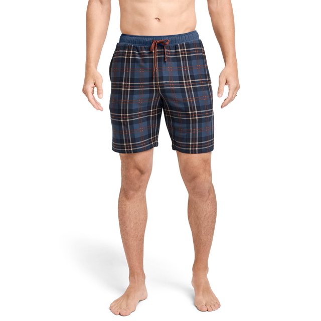 Jockey Ultra Soft Cooling Sleep Short for men, featuring a semi-fitted design with a plaid pattern in blue and brown tones. Made with soft recycled polyester and moisture-wicking fabric for breathable comfort. Includes a fabric-covered elastic waistband with drawstring closure, faux fly, and inseam pockets for small essentials.